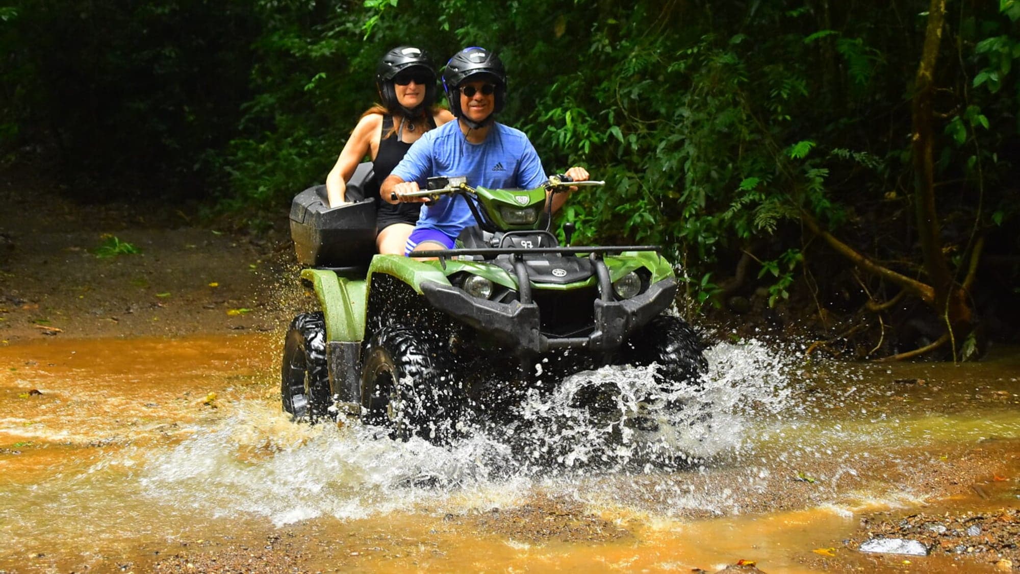 ATV on a dirt road through the Santa Teresa jungle