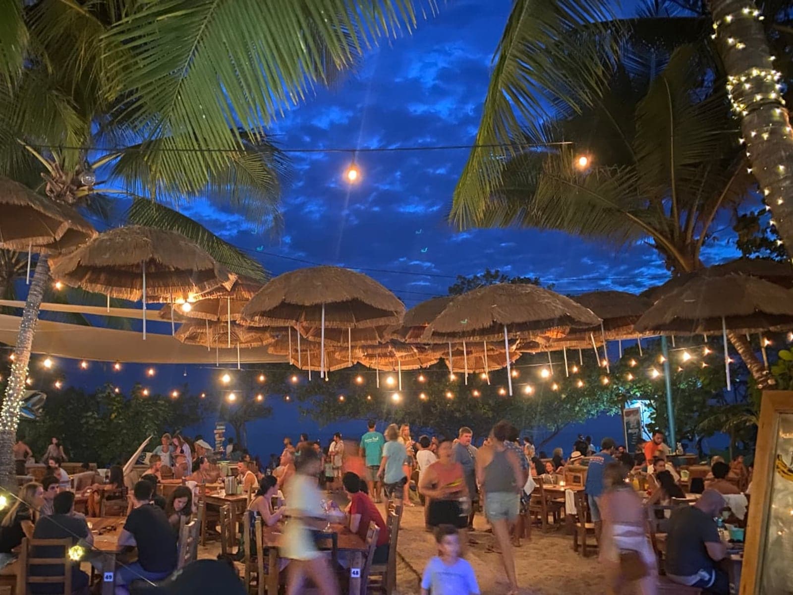 Banana Beach Club at sunset — day-into-night beach bar